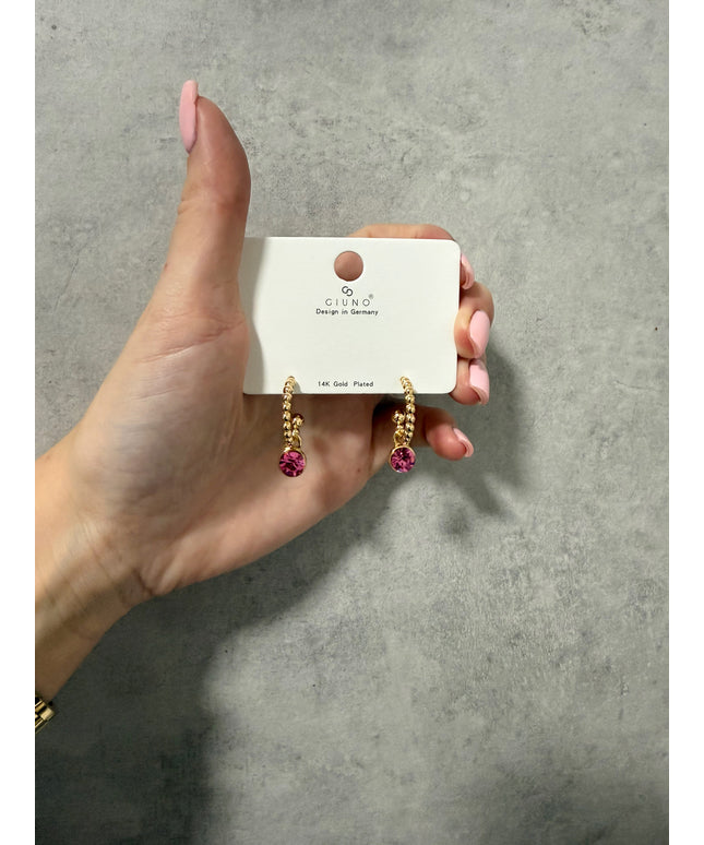 Ohrringe mit pinken Steinchen