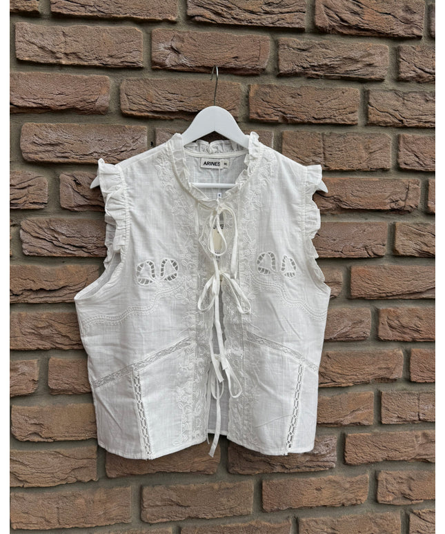 Bluse mit Lochstickerei und Schleifen