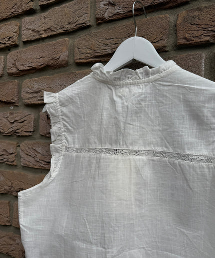 Bluse mit Lochstickerei und Schleifen