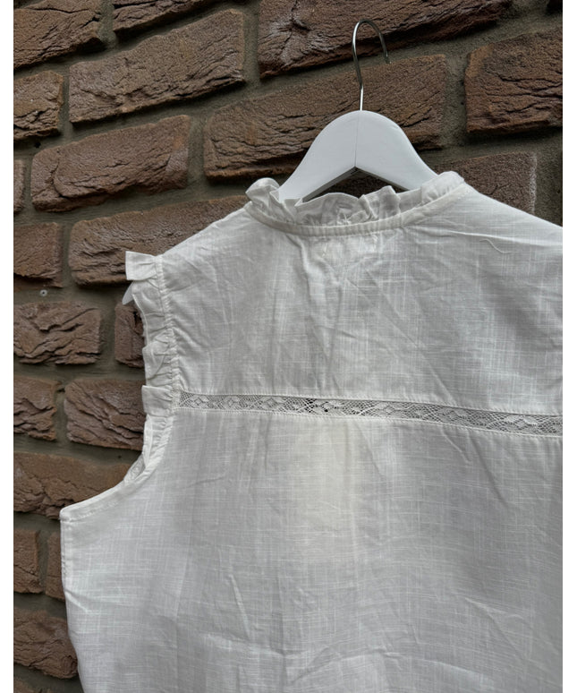 Bluse mit Lochstickerei und Schleifen
